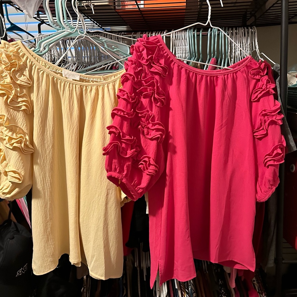 New without tags.  Yellow ruffle sleeve top.  Size small.